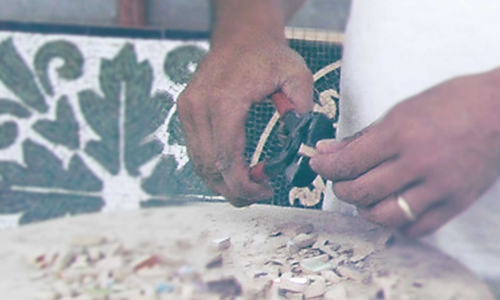 Mosaic tile design process, shaping tiles.